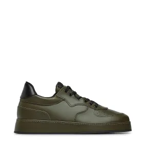 Green and black leather sneakers