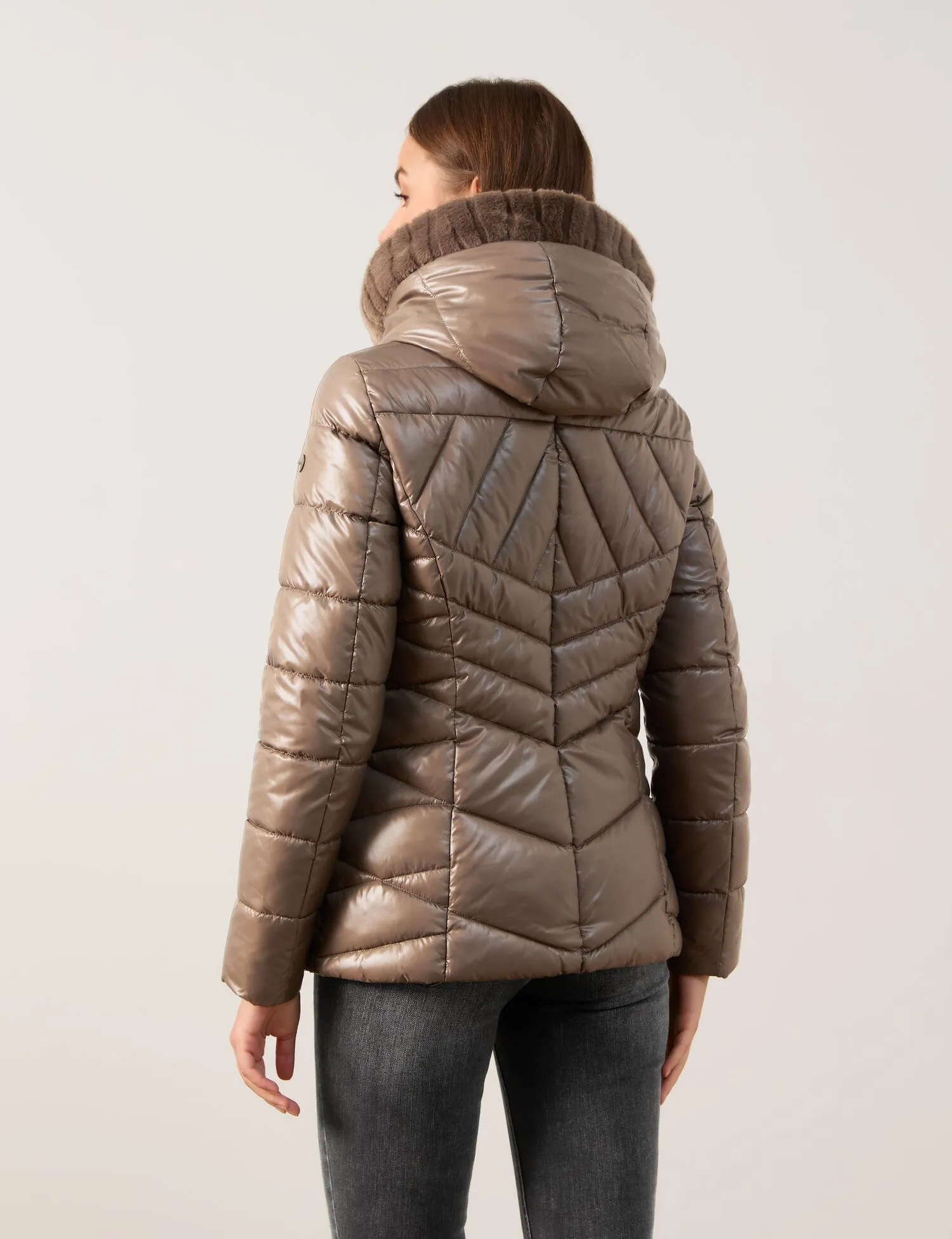 Shiny quilted jacket with faux fur